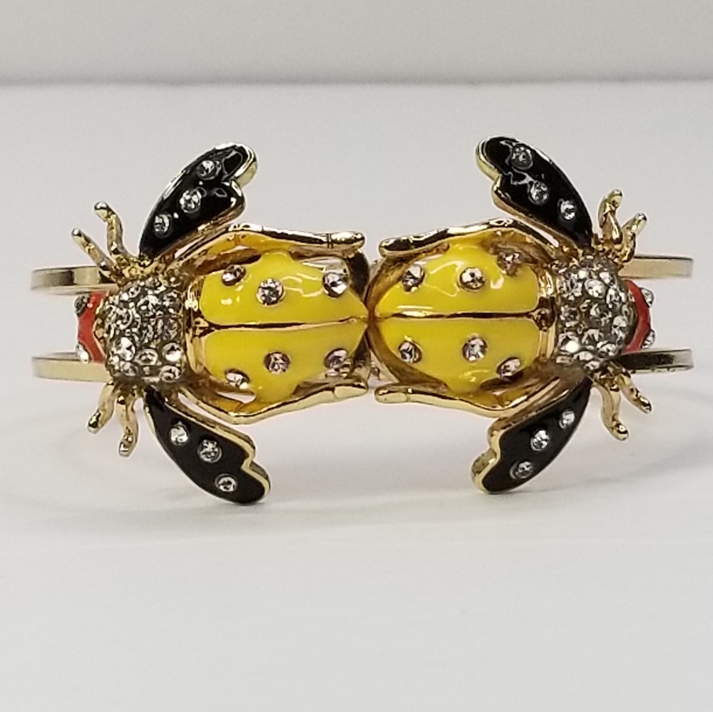 AMI CLUBWEAR DOUBLE SPARKLING BEE CLASP BRACELET.